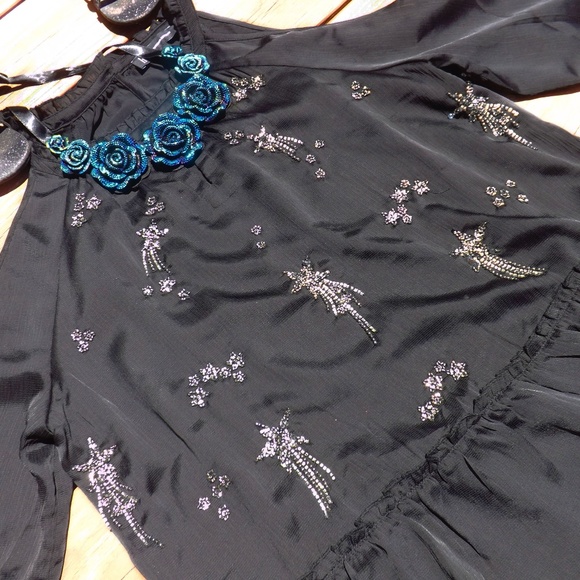 NWT black cold shoulder top with shooting stars - Picture 1 of 7